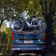 Carry-Bike Ford Custom V710 (fits Transit/Tourneo Custom single tailgate ?2023–, H1, also lift roof + VW Transporter/Caravelle ?2025, Rail Plus, 2–4 bikes / 2 E-Bike) - Fiamma bike racks for motorhomes and campervans designed for secure, reliable bicycle transport on the road - My Fiamma